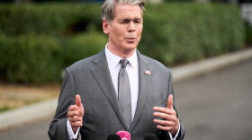 Treasury Secretary Scott Bessent speaks to members of the media outside the White House in Washington, Thursday, Aug. 20, 2026.
