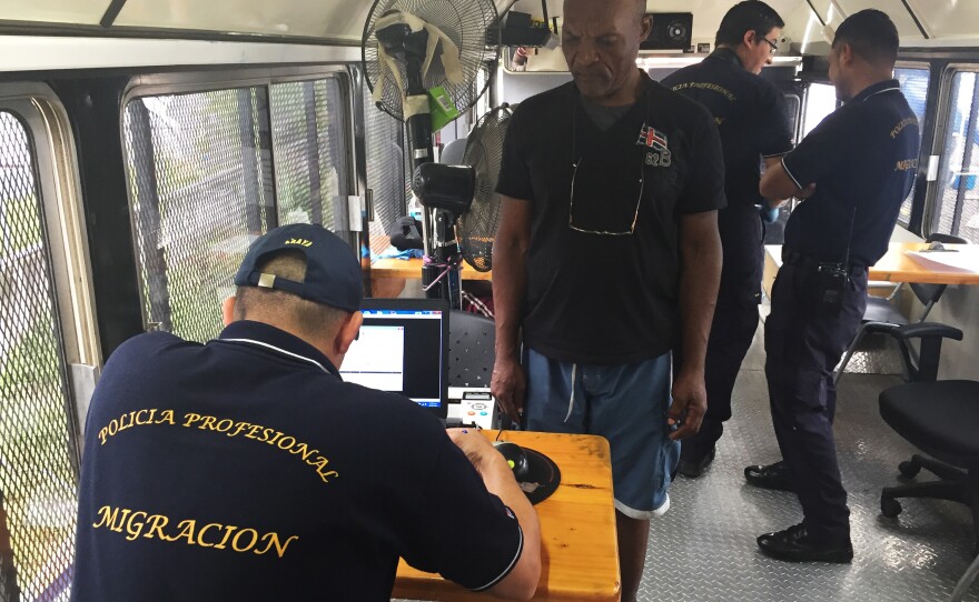 Migrants are processed at an impromptu post on the Costa Rica-Panama border.