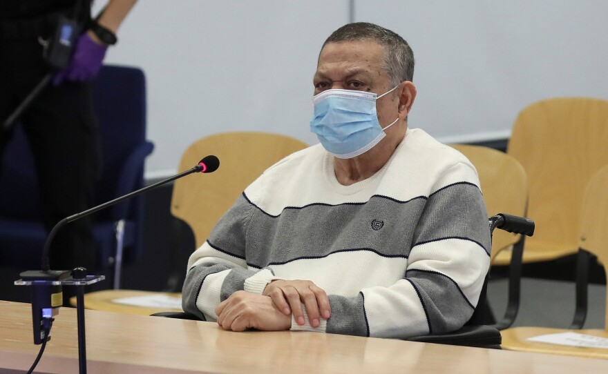 Former Salvadoran official Inocente Orlando Montano attends a trial in Madrid on June 8 for his alleged role in the killing of five Spanish priests in El Salvador in 1989.