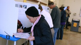 A woman votes at a polling place in California, 2010. 