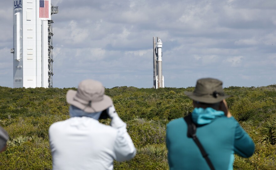 Photographers capture the Boeing Starliner capsule atop an Atlas V rocket as it is rolled out to the launch pad at Space Launch Complex 41, Saturday, May 4, 2024, in Cape Canaveral, Fla.