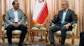 In this photo released by the Iranian Presidency Office, President Masoud Pezeshkian, right, speaks with Pakistan's Army Chief Field Marshal Gen. Asim Munir in Tehran, Iran, Saturday, May 23, 2026.