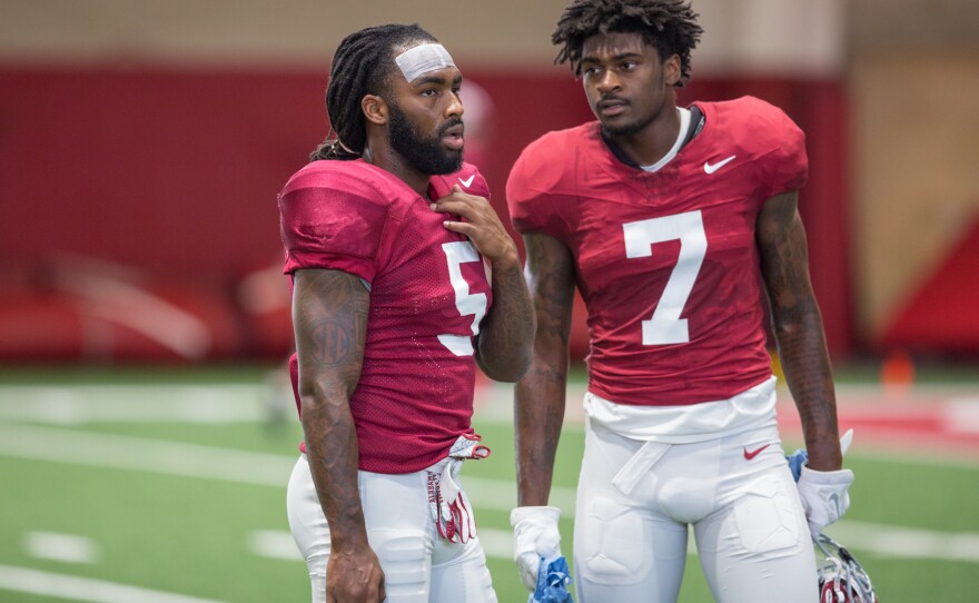Alabama defensive back Shyheim Carter, left, chats with Trevon Diggs during a Crimson Tide practice.