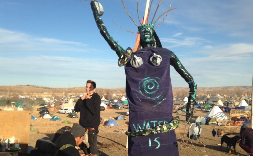 A sculpture stands at an encampment where protesters of the Dakota Access oil pipeline have been gathered for months near Cannon Ball, N.D., on Saturday.