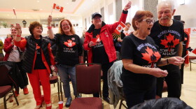 Supporters wait for results at the pro-Canada watch party in Edmonton, Alberta, Monday.