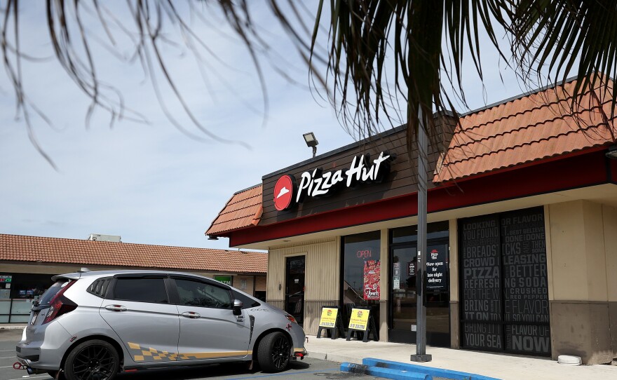 One big Pizza Hut franchisee in California cited the upcoming wage hike as a reason for laying off more than 1,000 delivery drivers in a shift to delivery apps like Uber Eats and DoorDash.