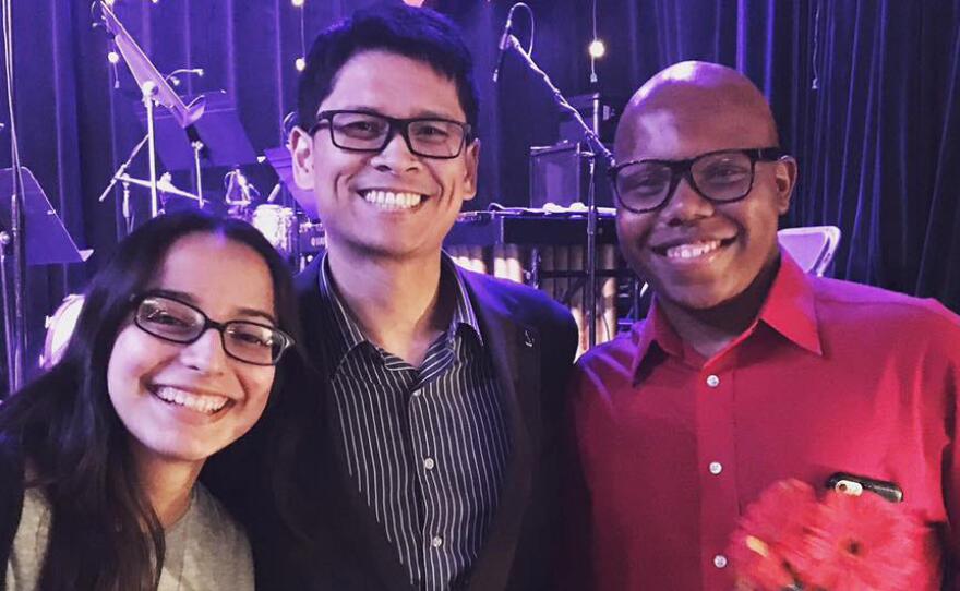 Draylen Mason, right, poses with his orchestra director, Hermes Camcho, center, and Mayareli Albiter at the Golden Hornet's Second Annual Young Composer Concert last year.