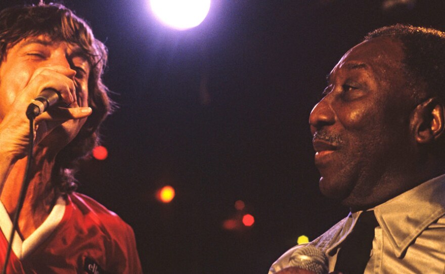 Mick Jagger and Muddy Waters perform together at Chicago's Checkerboard Lounge in 1981.