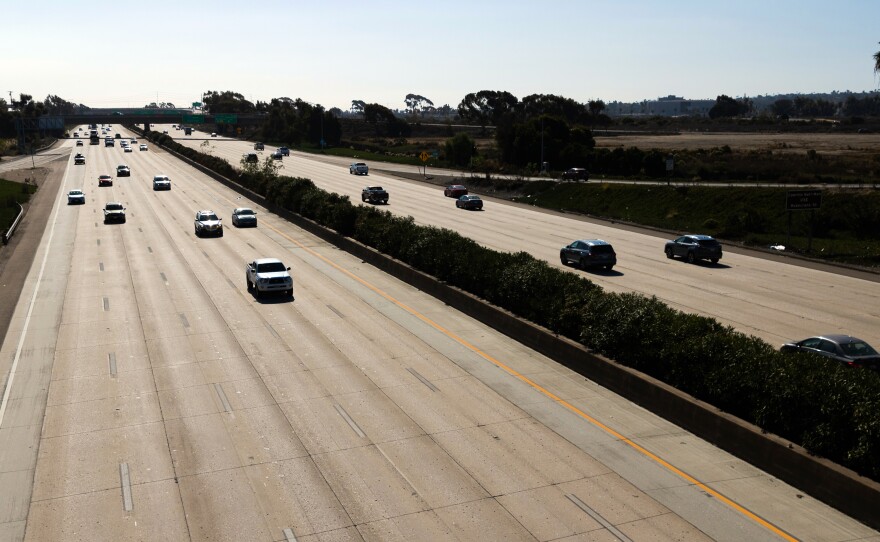 Traffic on Interstate 5 freeway at Sea World Drive on Nov. 24, 2020.