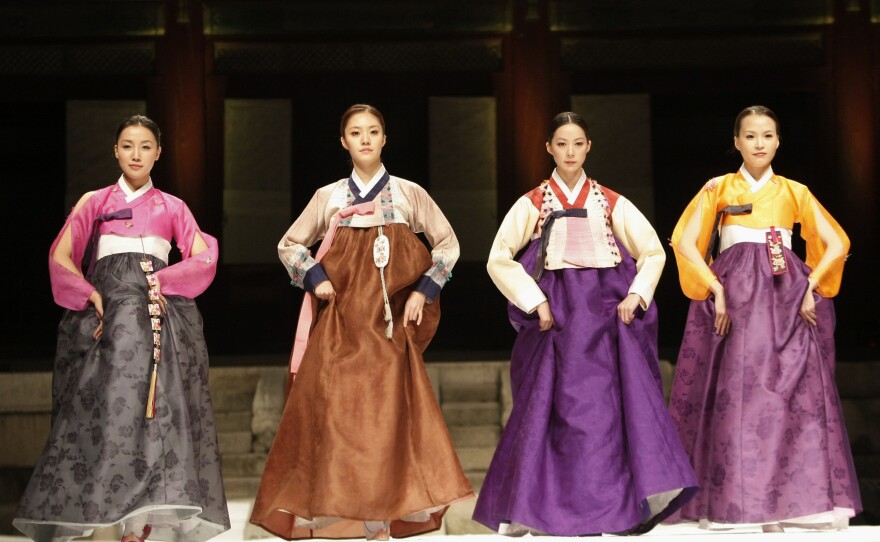 Models present the traditional costume known as hanbok during the 2010 Korea Hanbok Festival in Seoul.