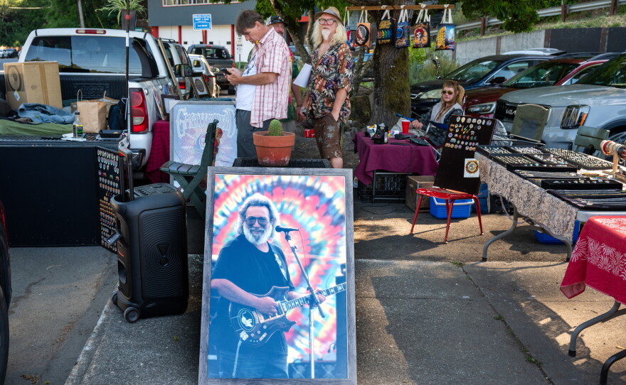 Vendors gathered in front of the entrance. Terrapin Roadshow performs at Monte Rio Amphitheater in Monte Rio, CA for a story about the longevity of the Grateful Dead's music and cultural scene.