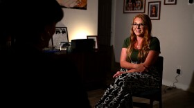 Amber Drucker sits in her home in La Mesa on Monday, Dec. 15, 2026.