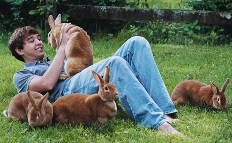 Johnny Haussener with rabbits. In 2005, he was awarded the Pennsylvania State Rabbit King, and in 2007 was on the winning judging team at ARBA nationals. Since then, he has become licensed ARBA Judge #887 and the current President of the Mason Dixon Rex Rabbit Breeders Association.