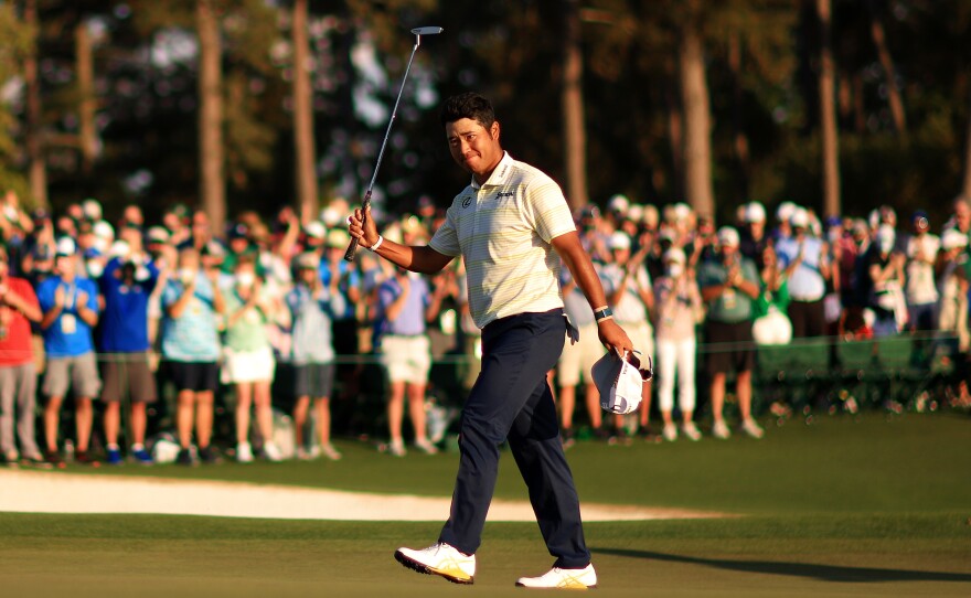 Hideki Matsuyama became the first Japanese man to win a major golf tournament after winning the Masters at Augusta National Golf Club Sunday. (Photo by Mike Ehrmann/Getty Images)