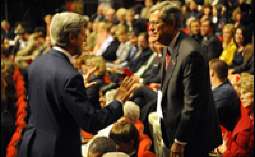 Democratic Sen. John Kerry of Massachusetts (left) speaks with former Republican Sen. Trent Lott of Mississippi prior to the first presidential debate in Oxford, Miss.