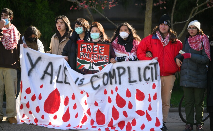 Yale students stage a protest in an intersection in downtown New Haven on April 22, 2024 after police cleared an encampment outside the Beinecke library, where Pro-Palestinian demonstrators had staged tents for three nights calling for the school to divest its endowment from weapon manufacturers they say play a role in Israel's war in Gaza.