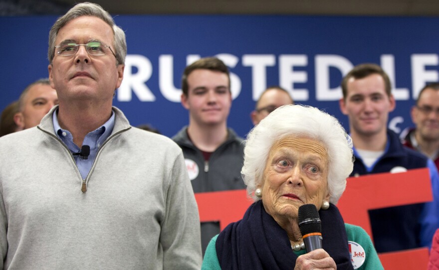 Former first lady Barbara Bush, mother of Republican presidential candidate Jeb Bush, campaigns with her son (left) at a town hall meeting at West Running Brook Middle School in Derry, N.H.