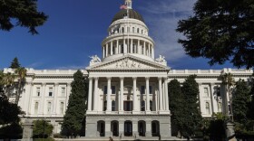 People walk around the California State Capitol, Aug. 5, 2024, in Sacramento, Calif.