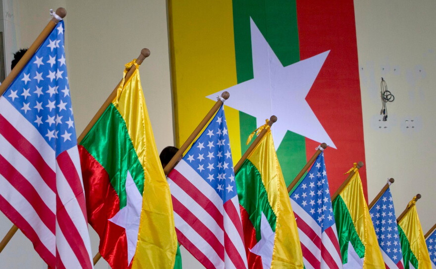 FILE - U.S. and Myanmar national flags are decorated at University of Yangon's convocation hall in Yangon, Myanmar, Nov. 19, 2012.