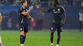 San Diego FC midfielder Onni Valakari, left, celebrates his goal with teammate midfielder Manu Duah, right, during the first half of Game 1 in the first round of MLS soccer's Western Conference playoff against Portland Timbers Sunday, Oct. 26, 2025, in San Diego.