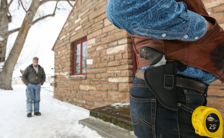 The armed individuals occupying part of the Malheur National Wildlife Refuge in Oregon include Ryan Bundy. On Thursday, he had a gun and a tape measure on his side. Bundy is the son of Cliven Bundy, whose 2014 armed standoff with the federal Bureau of Land Management in in Nevada drew national attention.