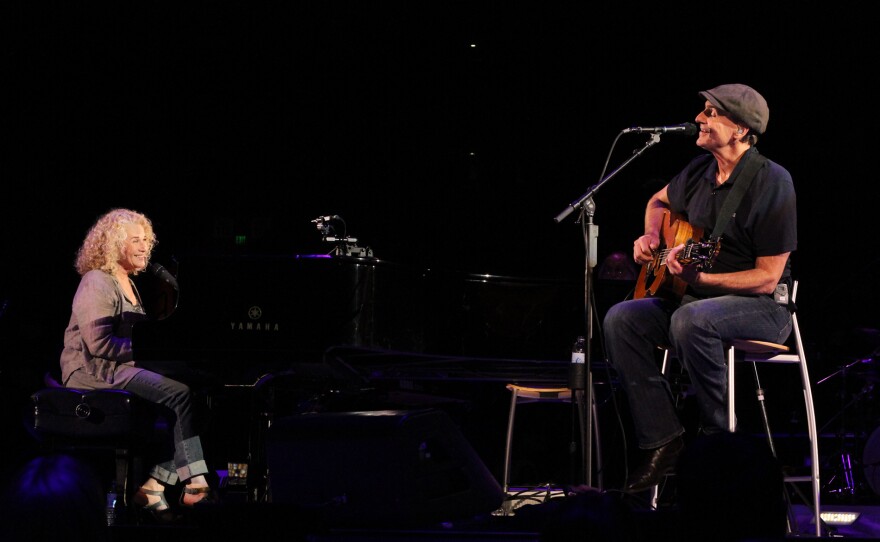 James Taylor and Carole King. The film features specially shot performances at the SNHU Arena New Hampshire, early archival footage, and film from the Troubadour reunion shows in 2007.
