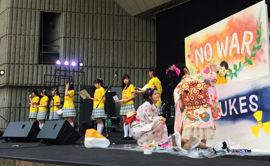 Pacifists staged a rally and march through Tokyo's neighborhoods on Saturday. Political protests in Japan are remarkably polite affairs, featuring ukeleles and tambourine music and college students in matching school girl skirts.