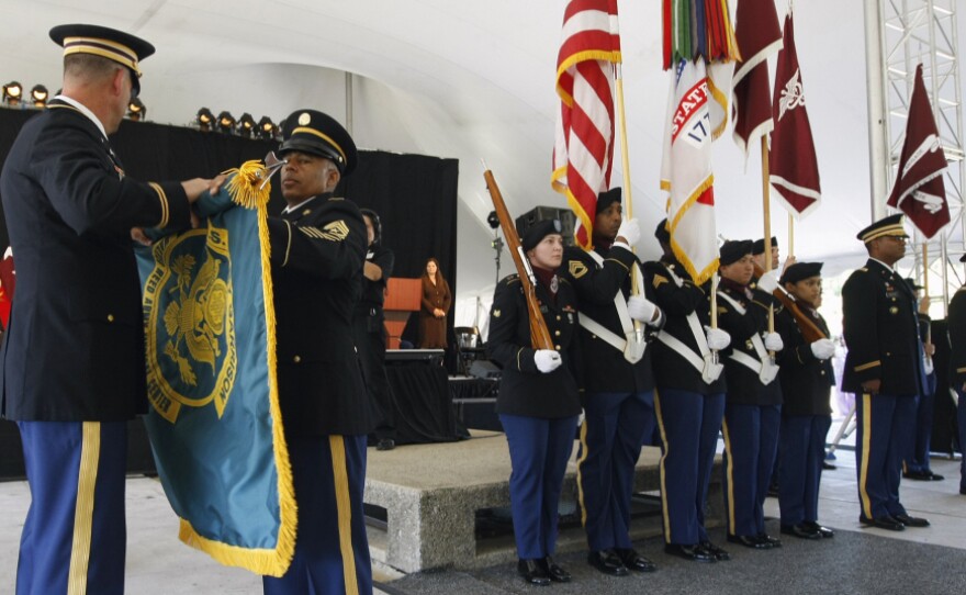 Army personnel take part in a flag casing ceremony at Walter Reed Army Medical Center in Washington, D.C., on July 27.