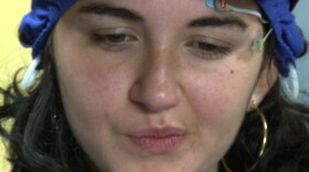 Maya wears the EEG cap and watches the commercial at the  headquarters of NeuroFocus in Berkeley, Calif.