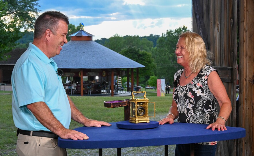 John Delaney (left) appraises an 1889 Tiffany & Co. Makers Carriage clock, in Shelburne, Vt.