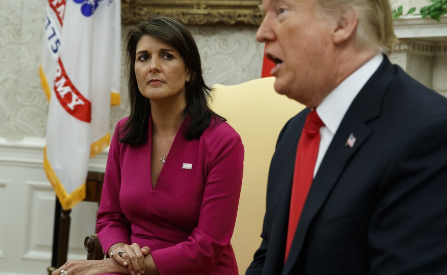 In this file image, President Donald Trump speaks during a meeting with outgoing U.S. Ambassador to the United Nations Nikki Haley in the Oval Office of the White House, Oct. 9, 2018, in Washington