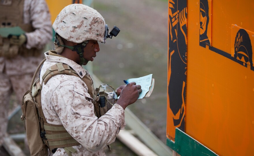 Jacques Yves Duroseau, shown here in 2016 when he was an active duty Marine, was found guilty by a federal jury over a weapons smuggling scheme.