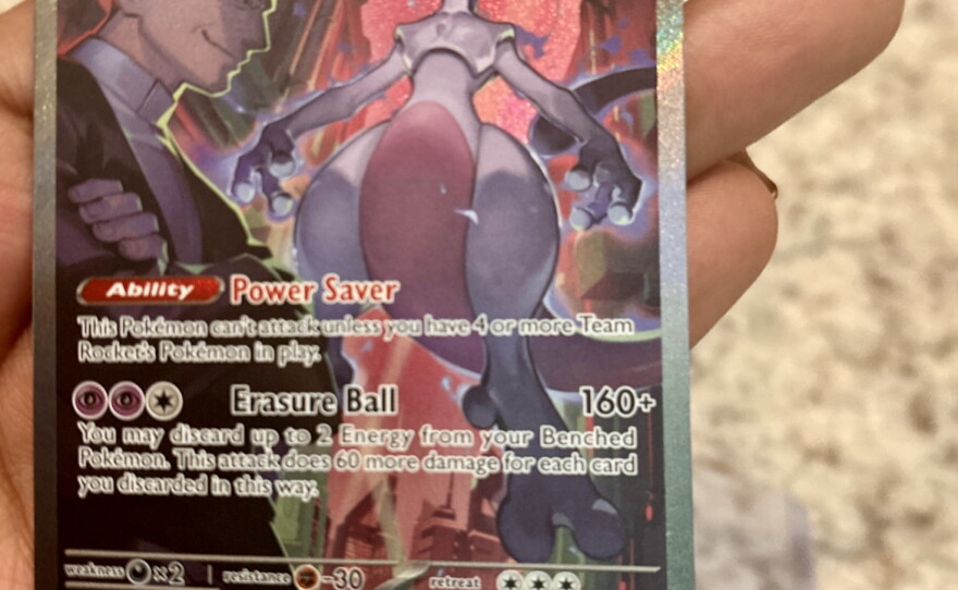 This Mewtwo and Giovanni Pokémon card was one about 100 cards Audy McAfee sold to cover moving costs to San Diego. Aug. 22, 2025.