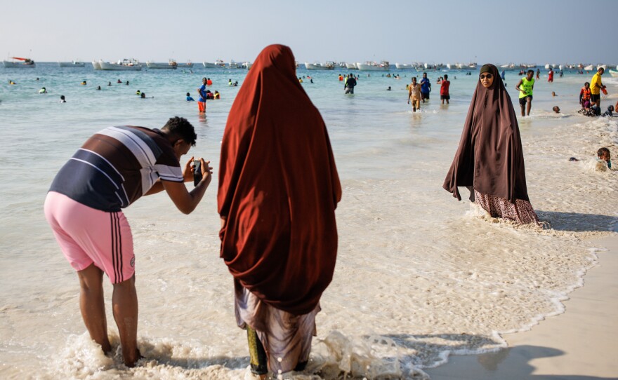 Families gather on Liido Beach in Mogadishu particularly on Fridays to relax.  One resident says Liido Beach is one of the only public places in the city that's open to everyone and relatively safe.