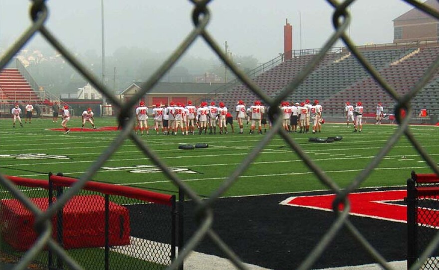 Steubenville High School football team on the field, Ohio.