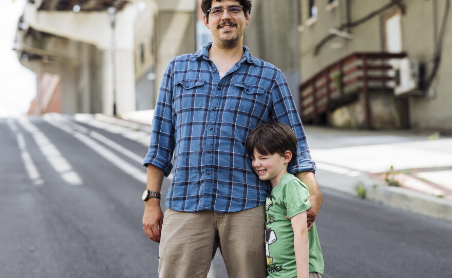 Chipper Thurber and his son, Bowen, 5,  in Morgantown, W.Va.  Thurber moved his family from Jamestown, Pa., to West Virginia and initially thought the relocation incentives were "too good to be true."