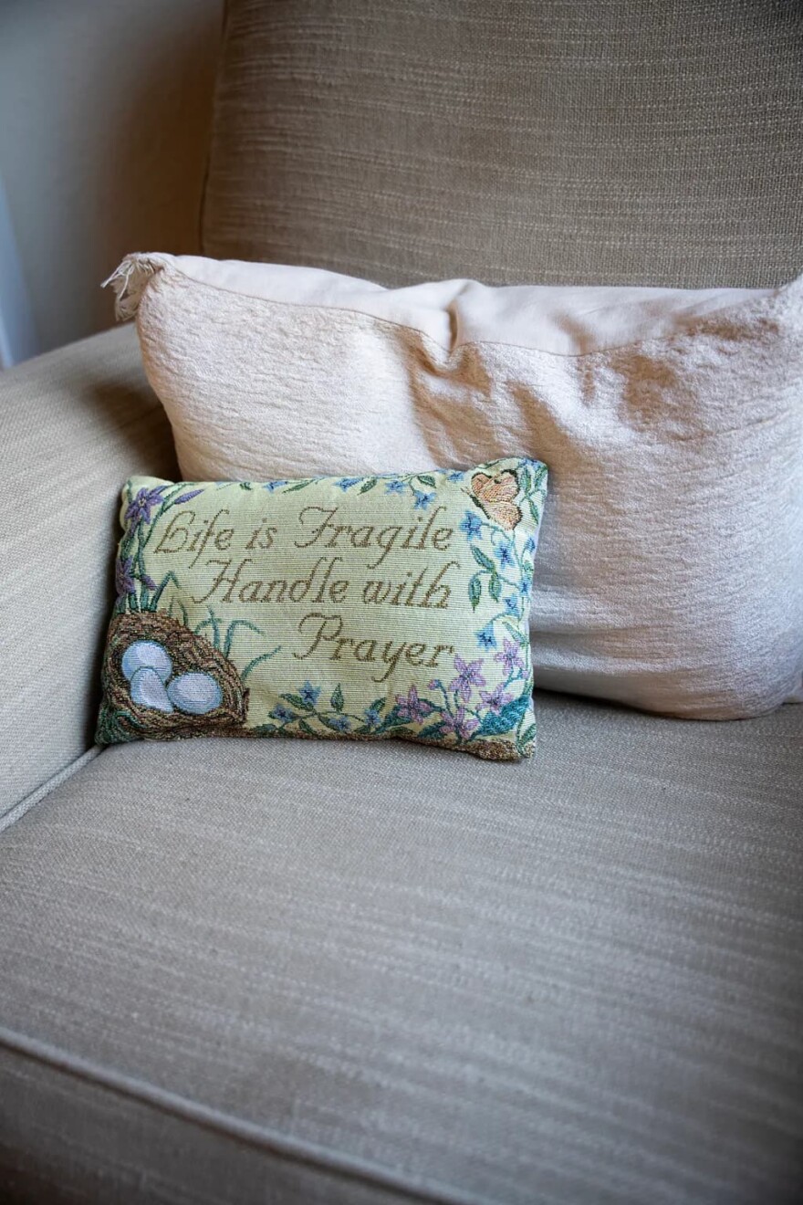 A pillow rests on an armchair at Ronda Deplazes’ home in Concord, on Oct. 27, 2025.