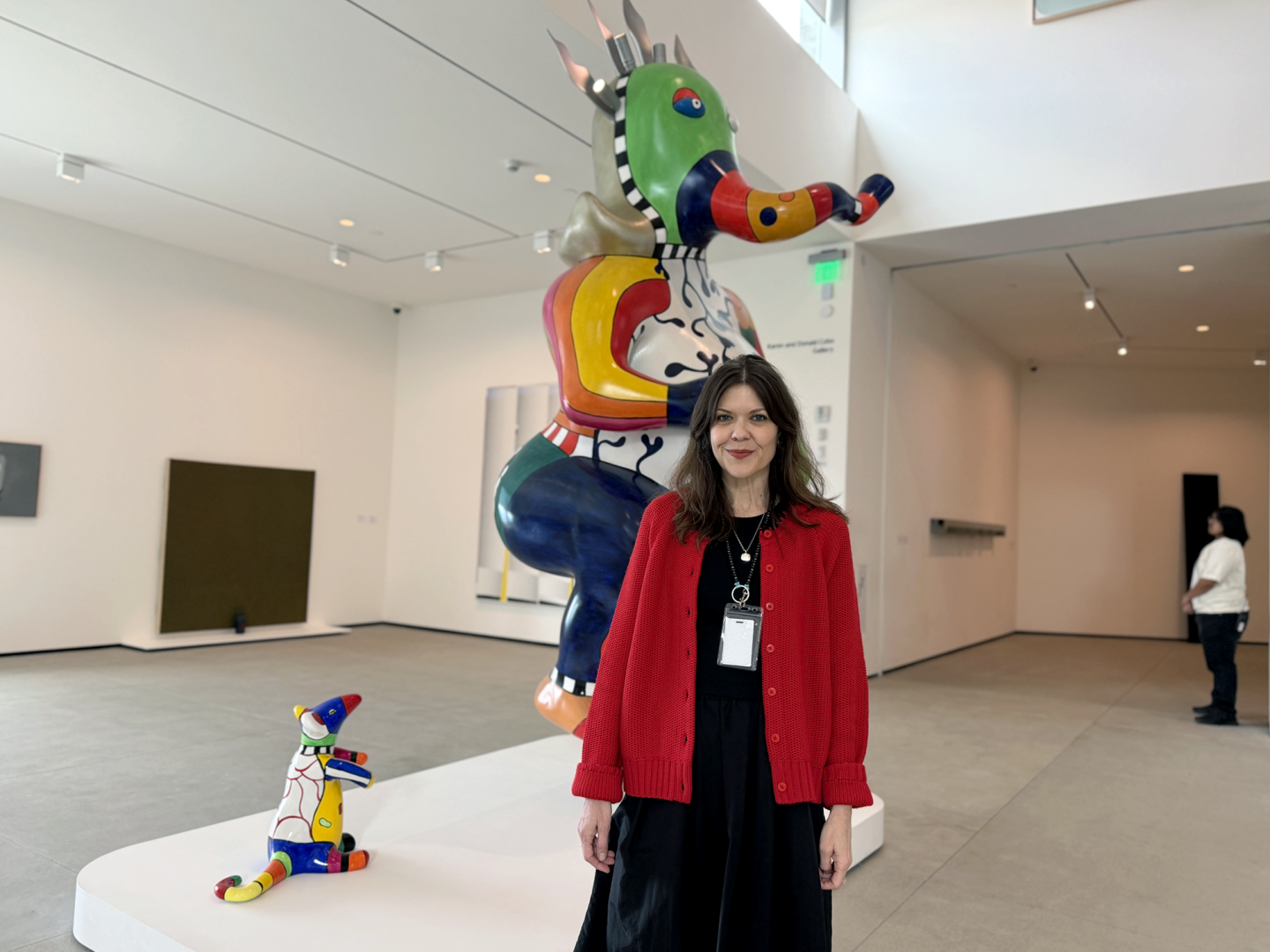 Jill Dawsey stands in front of a Niki de Saint Phalle sculpture at MCASD on Jan. 23, 2026.