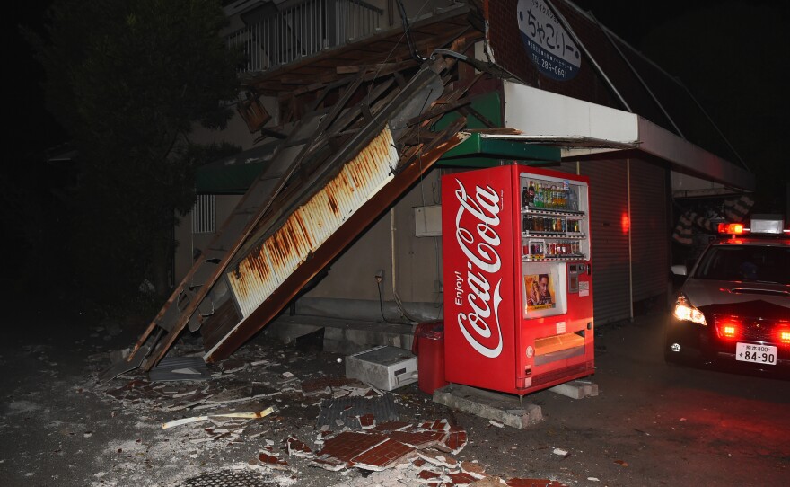 A partially collapsed house is seen after southern Japan was struck with a 6.2-magnitude earthquake.