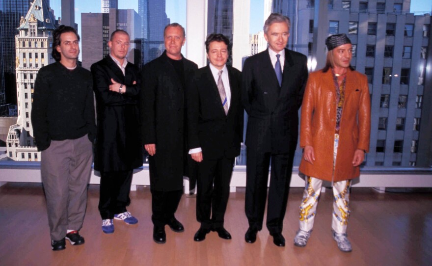 In this 1999 photo, LVMH CEO Bernard Arnault (second from right) poses with the four "kings" of LVMH's most prominent fashion brands: from left to right, Marc Jacobs (then of Louis Vuitton), the late Alexander McQueen (Givenchy), Michael Kors (then of Celine), architect Christian de Portzamparc, and John Galliano (then of Christian Dior).