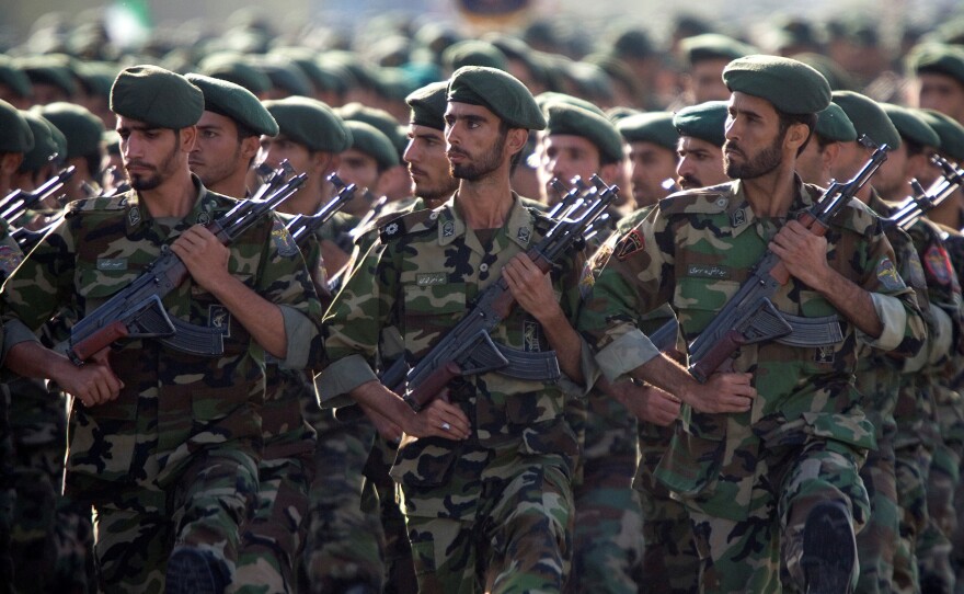 The U.S. has designated Iran's Revolutionary Guard Corps as a terrorist group. Here, members of the force march during a 2007 military parade in Tehran.