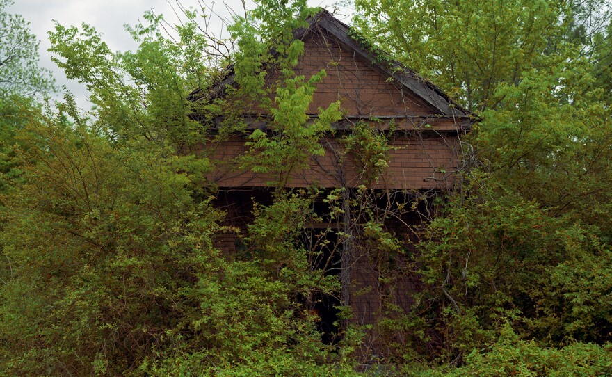 William Christenberry, Building with False Brick Siding, Warsaw, Alabama, 1991.