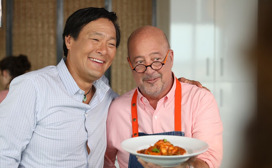 Andrew Zimmern (right) joins chef Ming Tsai (left) and cooks up a Shrimp Etouffee.