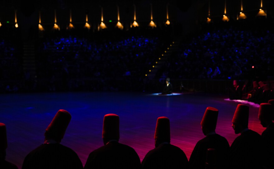 Whirling dervishes of the Mevlevi order perform during a Sheb-i Arus ceremony.