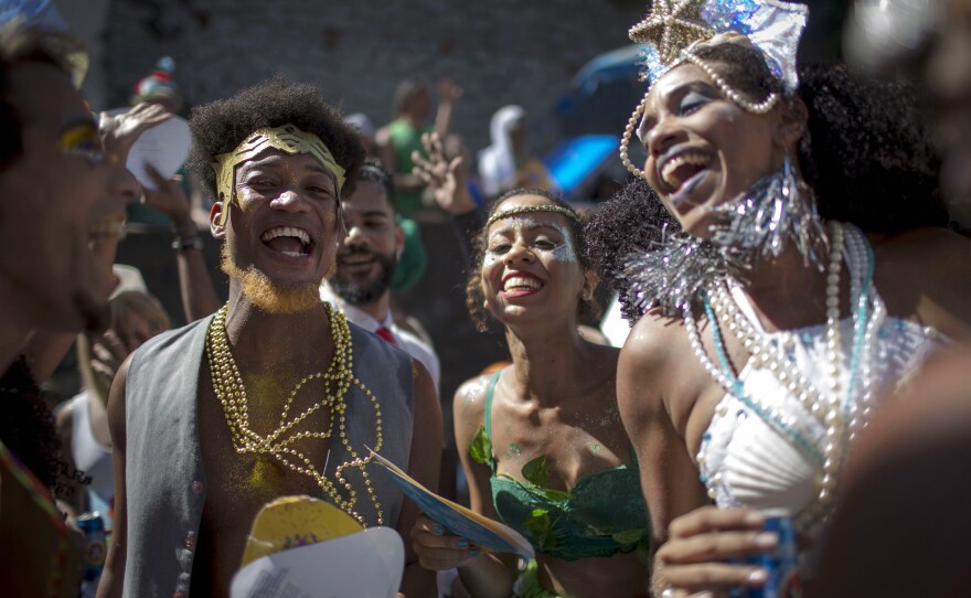 Revelers celebrate during the Carnival street parade of the <em>Bloco das Carmelitas</em> in the Santa Teresa neighborhood in Rio de Janeiro, Brazil, last week.