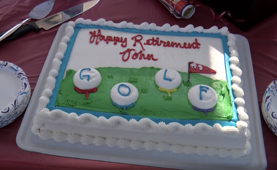 A cake is decorated with the word "GOLF" at a Tierrasanta retirement party for letter carrier John Piontek on June 30, 2021.