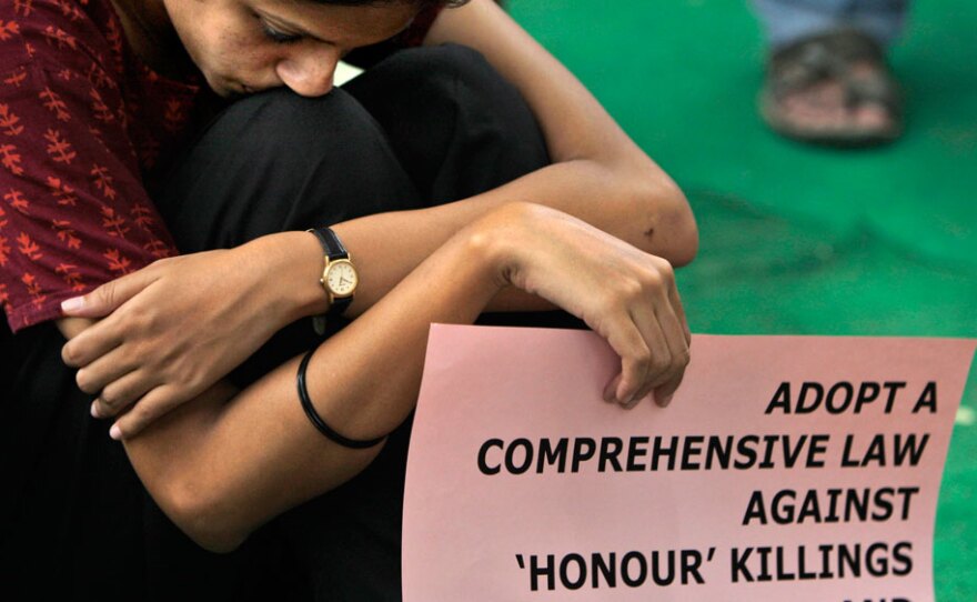 An activist from a nongovernmental organization participates in a demonstration June 25 in New Delhi against recent honor killings in the capital and other parts of the country.