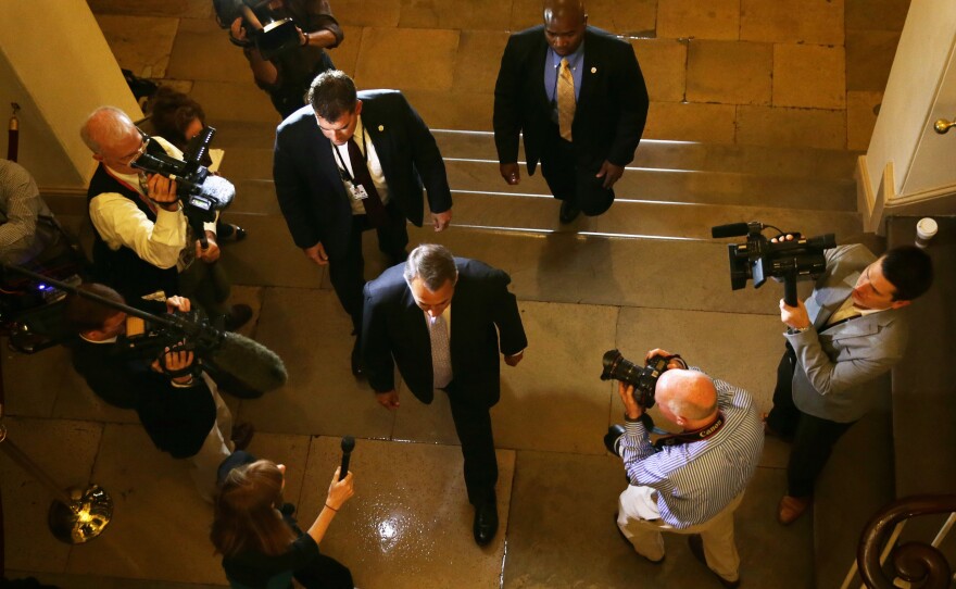 Speaker of the House John Boehner arrives at the Capitol on Saturday.