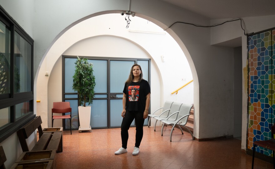 Myada Abu Khaled, an educator and Palestinian citizen of Israel, stands in the community center in Lod.
