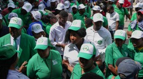 Members of the EDE (Committed to Development) political party arrive to register the party at the Provisional Electoral Council in the Petion-Ville neighborhood of Port-au-Prince, Haiti, Thursday, March 12, 2026.